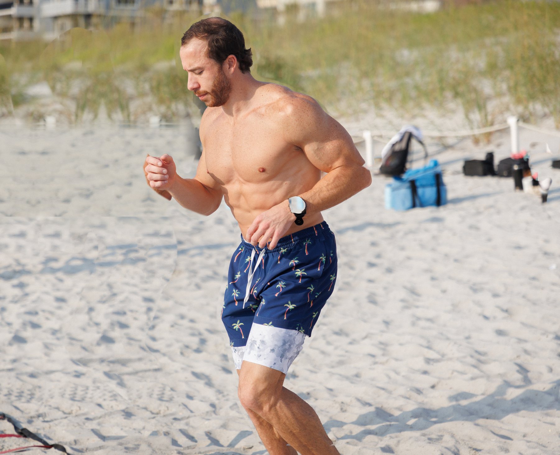 Chris Ochs running during a beach workout in Jacksonville.