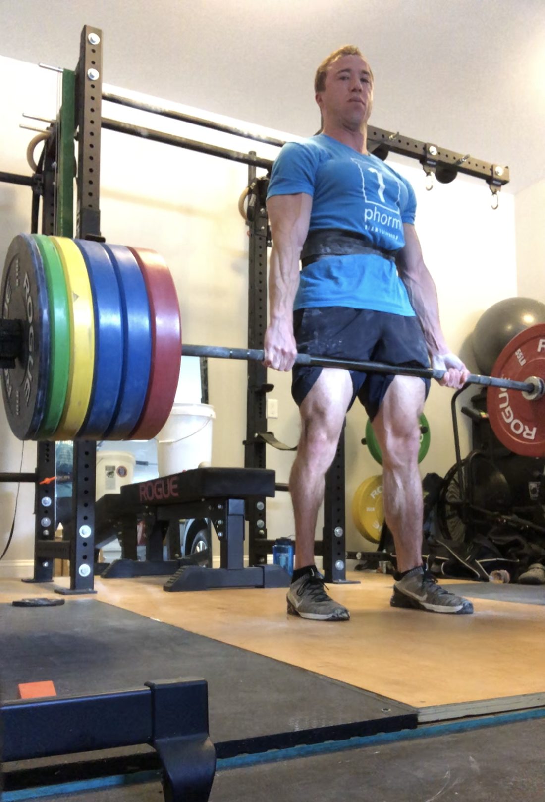 Chris Ochs deadlifting in his garage gym.